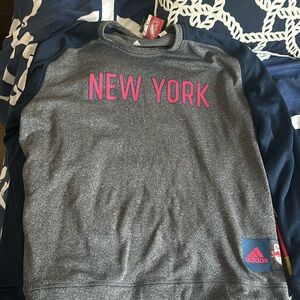 New York Red Bulls soccer sweatshirt.
